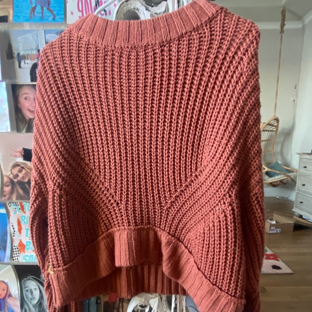 Cute reddish orange sweater